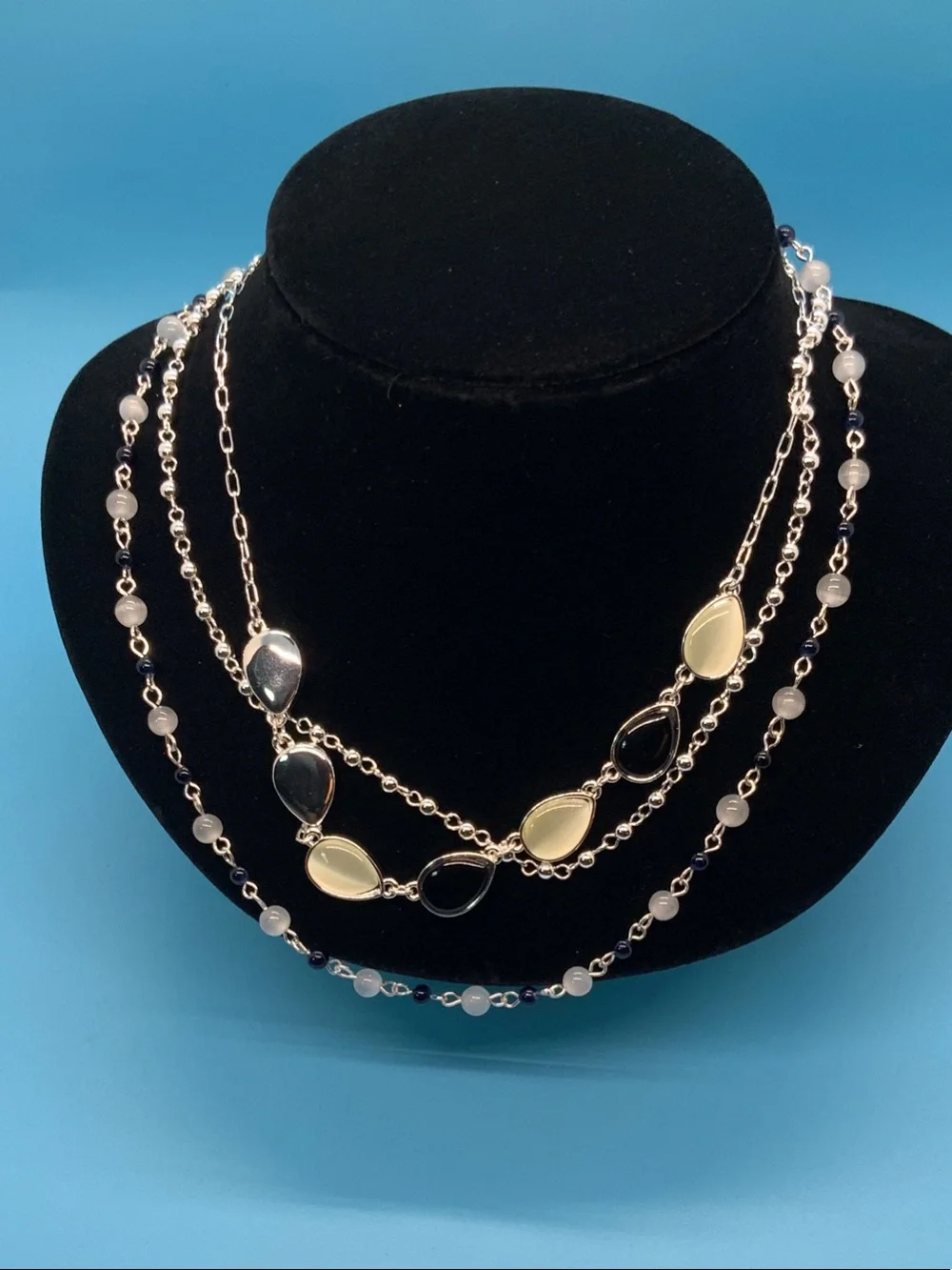 Multi-Strand Black and Cream Teardrop Necklace